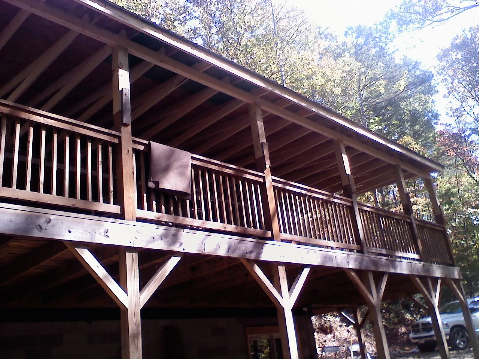 Timber framing under a new elevated porch and deck — Roof Leak Repair in Rayland by Roofing Brothers